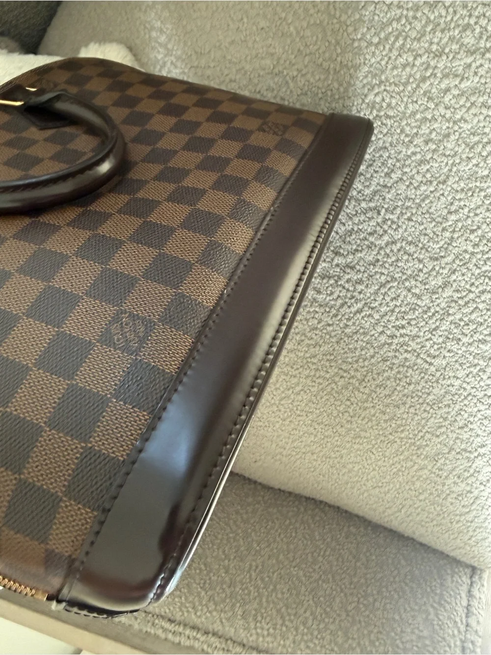 Louis Vuitton imperfections lock